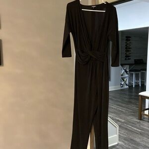 Like new long sleeve pants suit romper. Stretchy material.